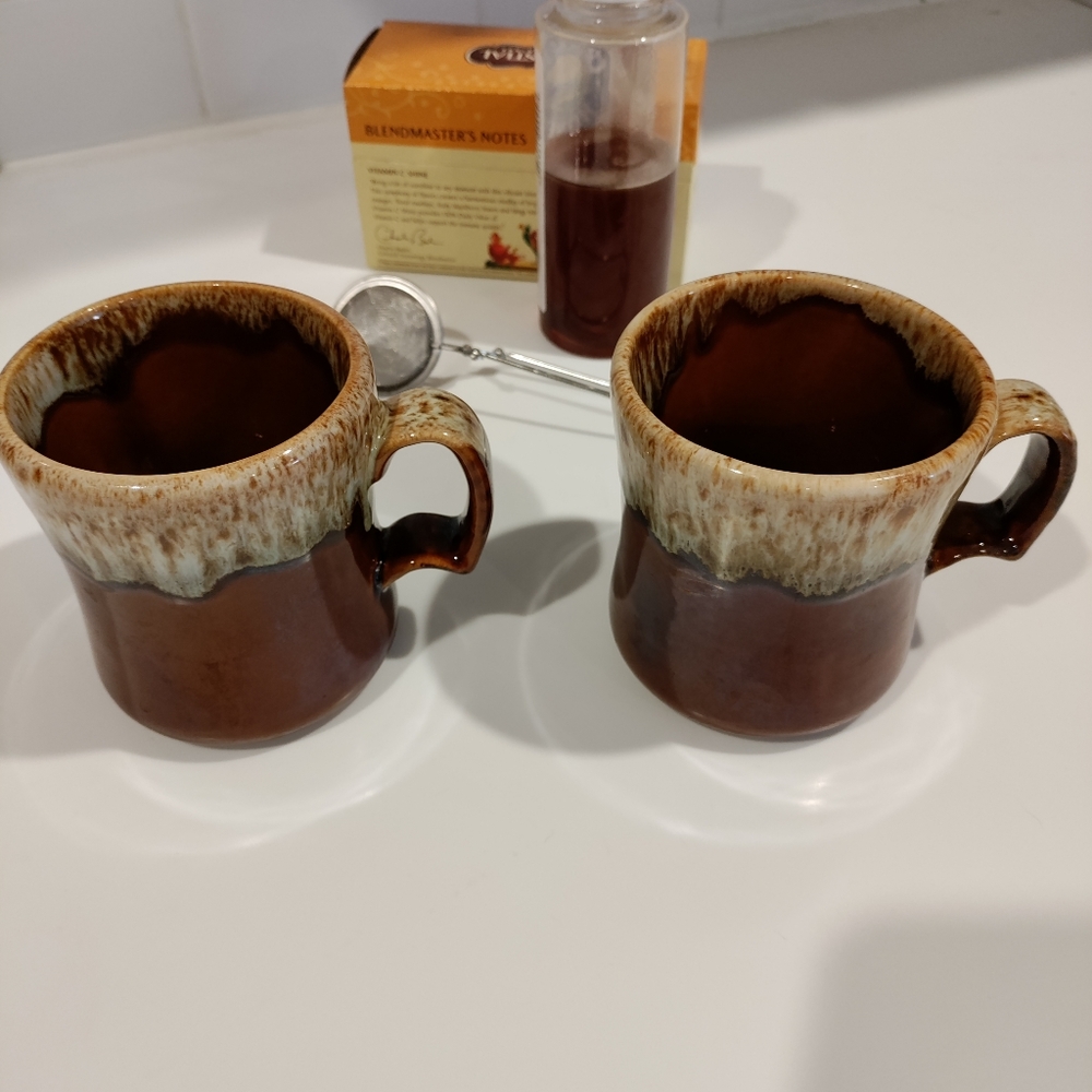 Pair of beautifully glazed ceramic coffee mugs